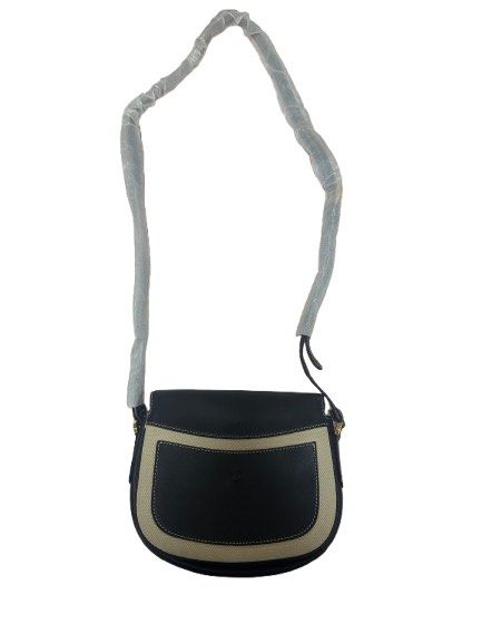 Tod's T-Timeless crossbody bag (Category: Luxury Bags & Wallets) located in Manila. Submitted by allthingsilove65 (Listing ID 1452220309, Image 3). Description: Tod’s T-Timeless crossbody bag featuring black leather trim and a beige canvas body. Brand new with plastic or packaging on the bag’s strap Retails for $1116 .