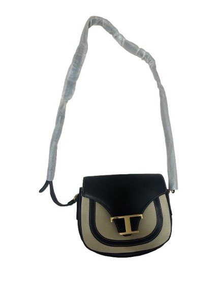 Tod's T-Timeless crossbody bag (Category: Luxury Bags & Wallets) located in Manila. Submitted by allthingsilove65 (Listing ID 1452220309, Image 2). Description: Tod’s T-Timeless crossbody bag featuring black leather trim and a beige canvas body. Brand new with plastic or packaging on the bag’s strap Retails for $1116 .