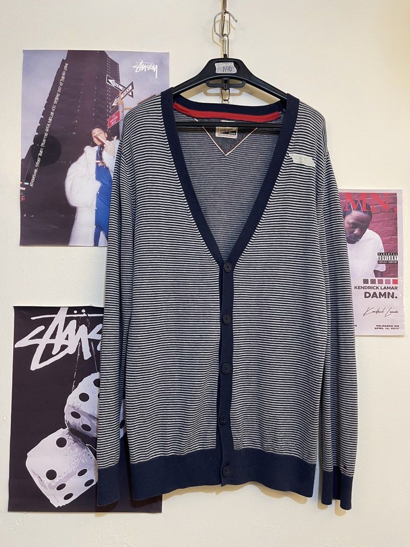 Tommy Hilfiger Denim Striped Cardigan (Category: Coats, Jackets and Outerwear) located in Tayabas. Submitted by stashsurplusph (Listing ID 1452310751, Image 1). Description: - Navy and white striped cardigan - Brand: Tommy Hilfiger Denim - V-neck with button-up front - Features a small chest pocket - Ribbed cuffs and hem - Ideal for layering over any outfit.