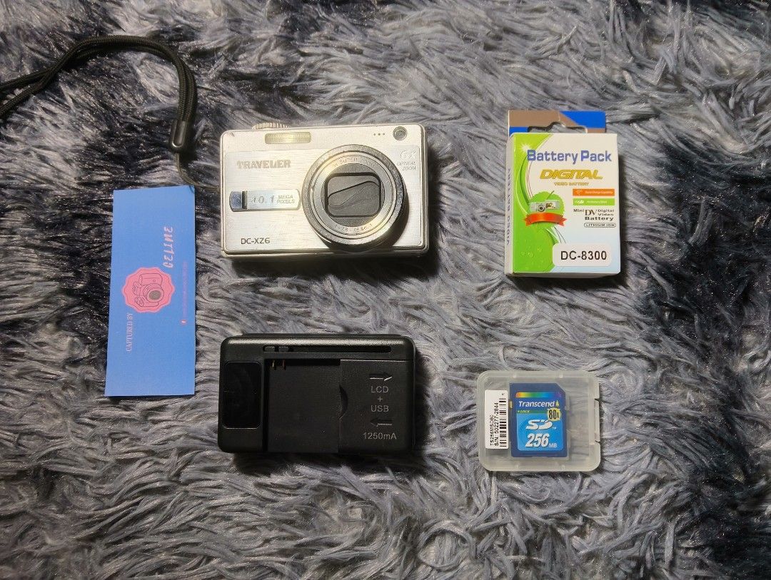 Traveler DC-XZ6 (Full Inclusion) (Category: Cameras) located in Caloocan City. Submitted by cbyceline (Listing ID 1452124281, Image 3). Description: Traveler DC-XZ6 1,000 + SF (NEGOTIABLE) Cosmetics: 9/10 •10.1 megapixel •Crisp Output Issue: •Signs of usage •Battery door (can improvise with electrical tape or rubber band) •May topak when you try to change the modes Ready-to-use inclusion: •Unit •Strap •Battery •Universal Charger •SD Card (256mb) 