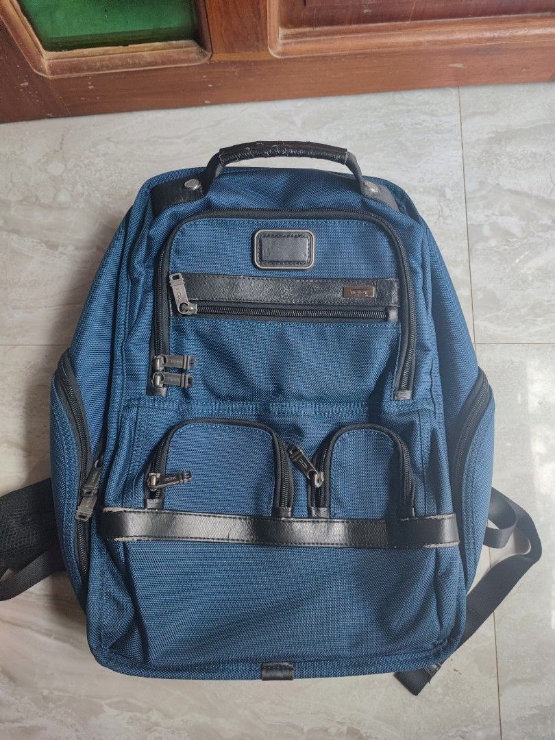 Tumi Backpack Blue Nylon Leather Trim (Category: Luxury Bags & Wallets) located in Talacogon. Submitted by mr1070 (Listing ID 1452254323, Image 1). Description: - Genuine blue Tumi backpack - Crafted from durable nylon with premium leather accents - Multiple compartments for excellent organization - Padded shoulder straps ensure maximum comfort - Ideal for both travel adventures and everyday commutes - Shows some signs of wear, but remains in goo