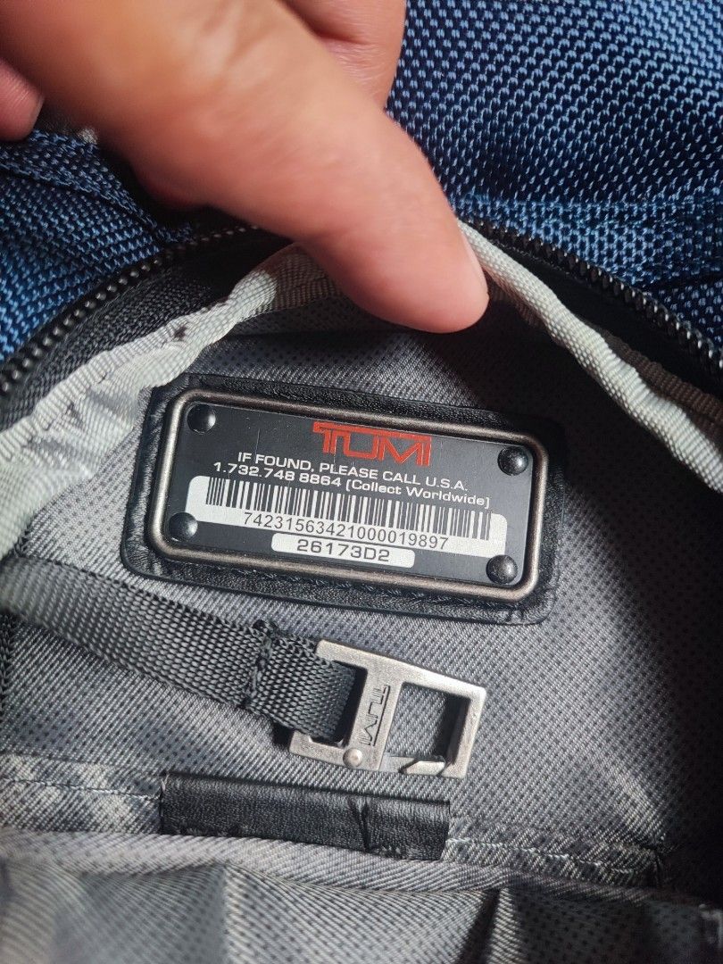 Tumi Backpack Blue Nylon Leather Trim (Category: Luxury Bags & Wallets) located in Talacogon. Submitted by mr1070 (Listing ID 1452254323, Image 2). Description: - Genuine blue Tumi backpack - Crafted from durable nylon with premium leather accents - Multiple compartments for excellent organization - Padded shoulder straps ensure maximum comfort - Ideal for both travel adventures and everyday commutes - Shows some signs of wear, but remains in goo