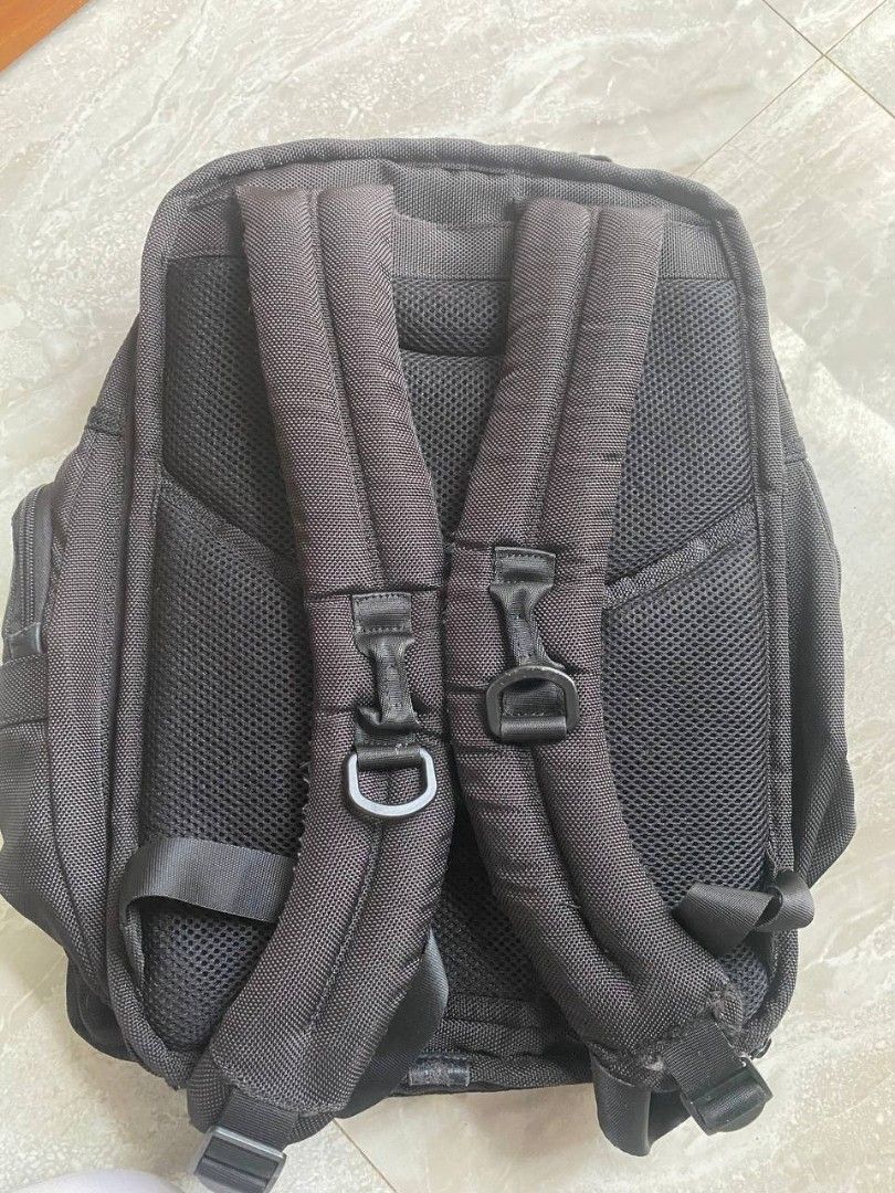 Tumi Check Point Friendly Laptop Backpack (Category: Luxury Bags & Wallets) located in Talacogon. Submitted by mr1070 (Listing ID 1452253855, Image 2). Description: - Black Tumi backpack - Checkpoint friendly laptop compartment - Multiple pockets for organization - Durable ballistic nylon material - Ideal for travel and daily commutes.