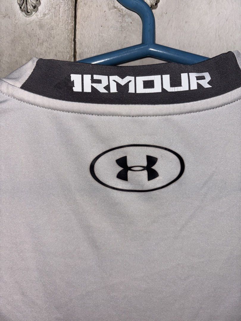 Under Armour Compression Sleeveless (Category: Activewear) located in Pasig City. Submitted by timmybatoon (Listing ID 1452173027, Image 3). Description: Under Armour Compression Sleeveless Size on tag: M Dimensions: 16inW x 24inL Price: 700 .