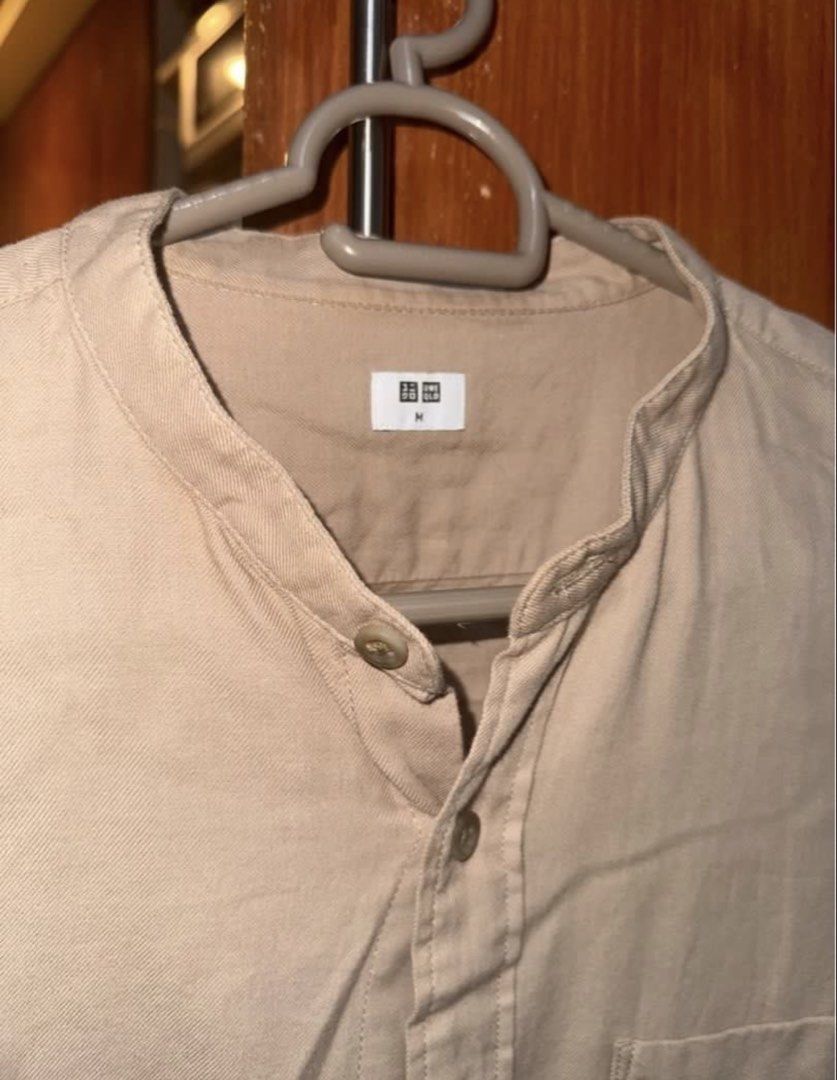 Uniqlo Mandarin Collar Long Sleeve Shirt Size M (Category: Tshirts & Polo Shirts ) located in Manila. Submitted by ianventory (Listing ID 1452257755, Image 3). Description: - Uniqlo Long Sleeve Shirt - Mandarin Collar - Button-up Front - Chest Pocket - Color: Light Beige/Tan - Size: Medium (M) - Ideal for Casual Wear.