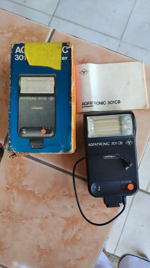 UNTESTED - AGFATRONIC 301CB Computer Flash (Category: Cameras) located in Naic. Submitted by ryleski (Listing ID 1452146706, Image 1). Description: Agfatronic 301CB Computer Flash (Untested) *Comes with Original box and Manual *Box shows some wear but unit looks good DELIVERY *MOP: GCASH *MOD: J&T/LBC/LALAMOVE (Delivery fees are shouldered by the buyer) .