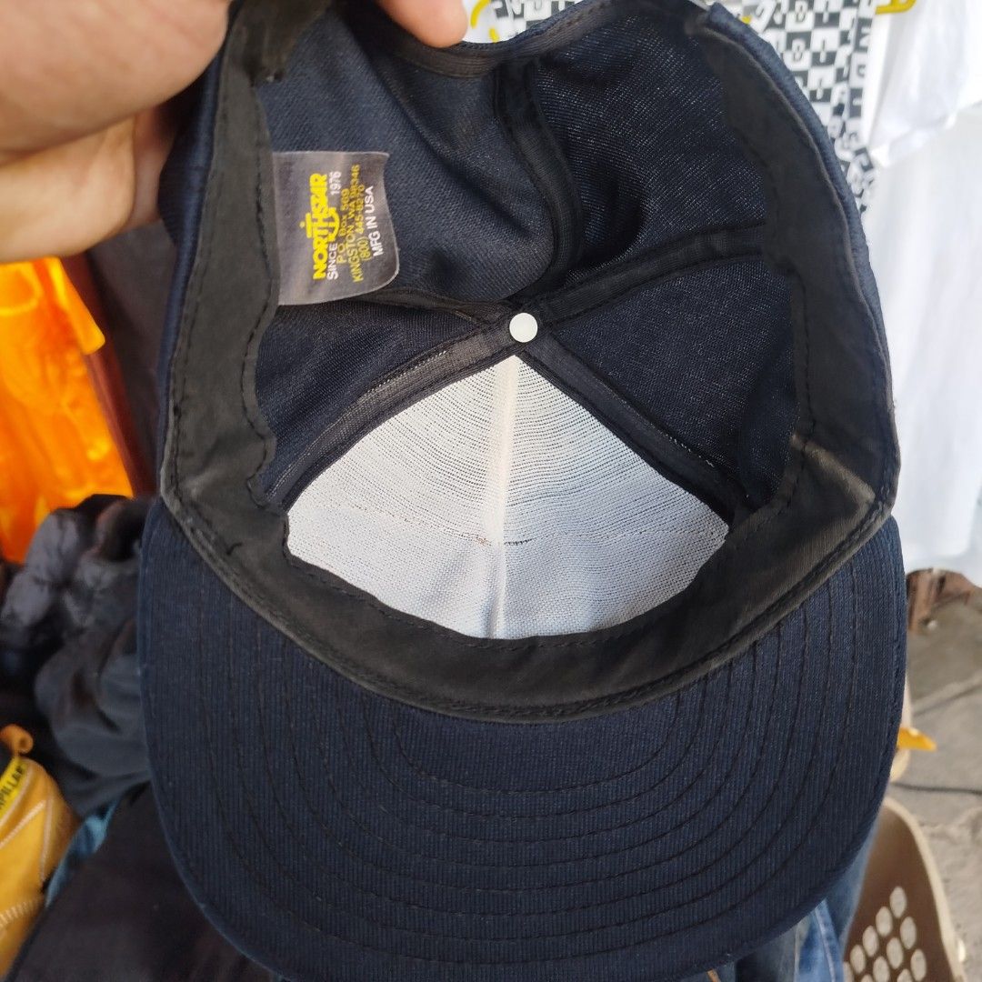 USCG Activities Europe London Snapback Cap (Category: Caps & Hats) located in Davao. Submitted by vernoneighty4 (Listing ID 1452264159, Image 2). Description: - Navy blue snapback cap - Features 'USCG Activities Europe London' embroidery with flags - Made by Northstar (established 1976) - Adjustable strap at the back - Made in USA - Perfect for USCG collectors and memorabilia enthusiasts.