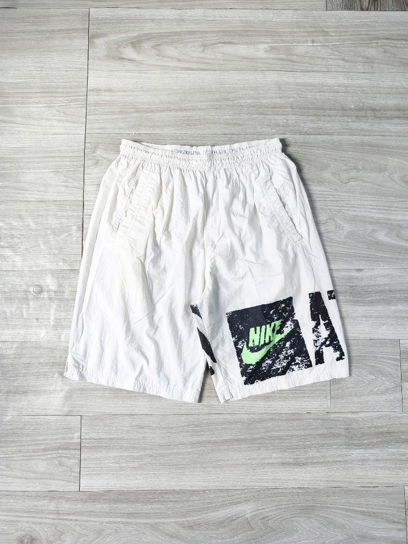 Vintage 90s Nike Athletic short (Category: Shorts) located in Paranaque City. Submitted by pickersform (Listing ID 1452303463, Image 1). Description: Vintage 90s Nike athletic short size Large waistline 28-34 / length 21 / opening 12 - Elastic waistband with drawstring - Perfect for sports or casual wear.