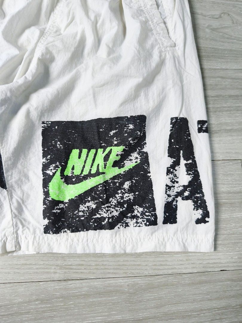 Vintage 90s Nike Athletic short (Category: Shorts) located in Paranaque City. Submitted by pickersform (Listing ID 1452303463, Image 3). Description: Vintage 90s Nike athletic short size Large waistline 28-34 / length 21 / opening 12 - Elastic waistband with drawstring - Perfect for sports or casual wear.