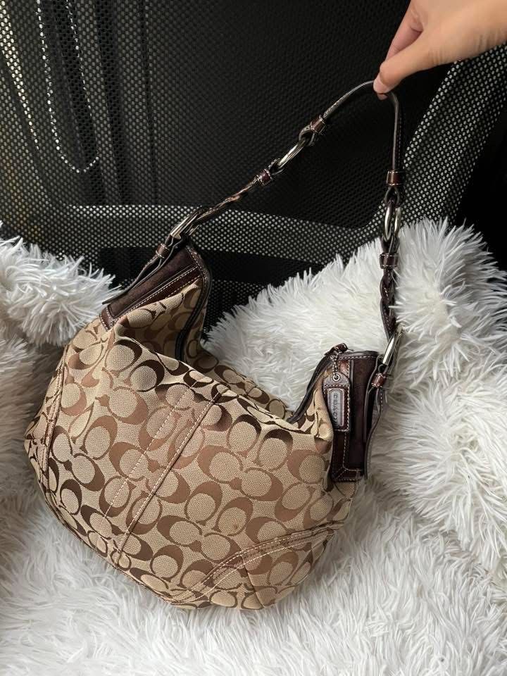 vintage coach braided hobo bag (Category: Shoulder Bags) located in Cabanatuan. Submitted by lilyscart (Listing ID 1452294364, Image 2). Description: vintage coach braided hobo bag (vv pretty) — 8/10 condition — guaranteed authentic ☑️☑️ — signs of usage — issue is posted (yung sa handle niya) — super duper magandaa — kasya ipad (13inches) & essentials dami kayo malalaman pls do manage ur expectation as this is not bnew 🍀 mop: gcash, bank transf