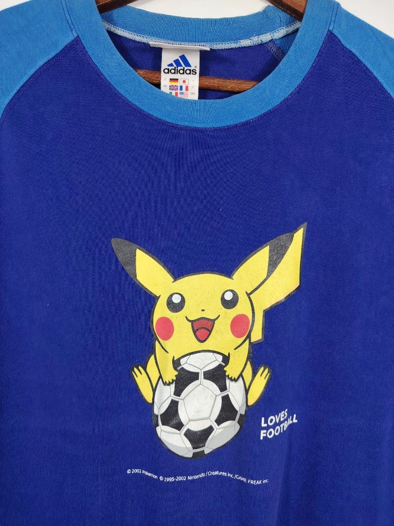 Vintage Y2K Adidas x Pikachu T-shirt #used#bundle#thrift#preloved#vtg#vintage#designer#streetwear#sportswear#workwear#luxury#techwear#80s#90s#y2k#band#art#music#cartoon#movie#anime#skate#surf#racing#casual#outdoor#denim#chambray#selvedge#japanese#western (Category: Tshirts & Polo Shirts) located in Johor Bahru. Submitted by mrs_orange (Listing ID 1452264351, Image 1). Description: - Measurement Details- Chest : 22" Lenght : 28" Material: 100 %Cot