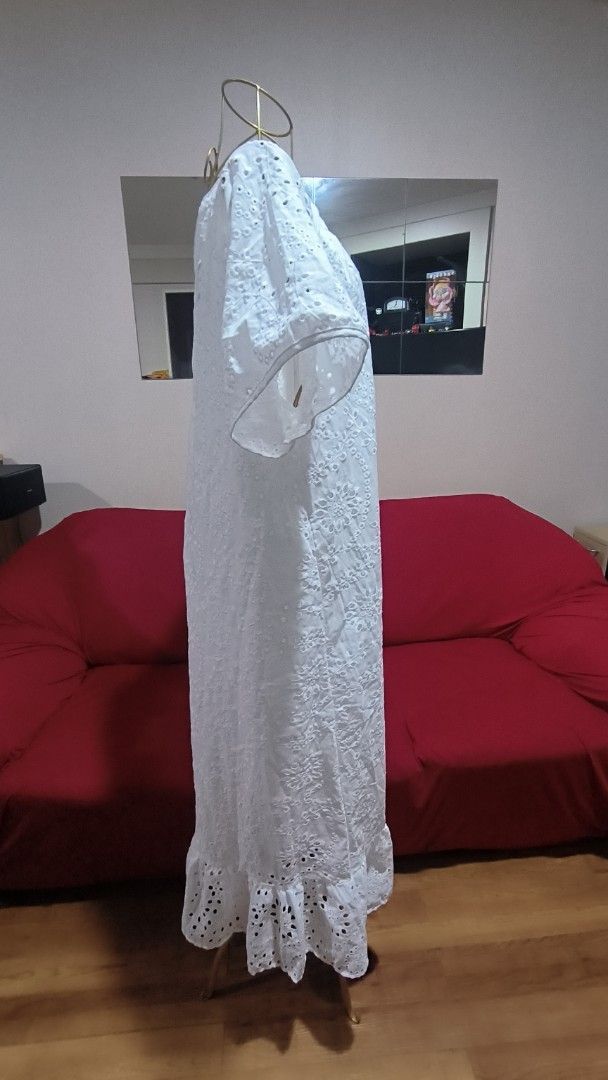 White Eyelet Lace Maxi Dress (Category: Dresses) located in Antipolo. Submitted by secondcharmstore (Listing ID 1452212384, Image 3). Description: -like new, no tag never worn -chest: 42-44 inches -waist: 44-46 inches -length: 48 inches - Beautiful white maxi dress - Intricate eyelet lace detailing - Short sleeves - Feminine ruffled hem - Lightweight and airy fabric - Ideal for summer occasions or beach cover-up - Easy to wear and comfortable.