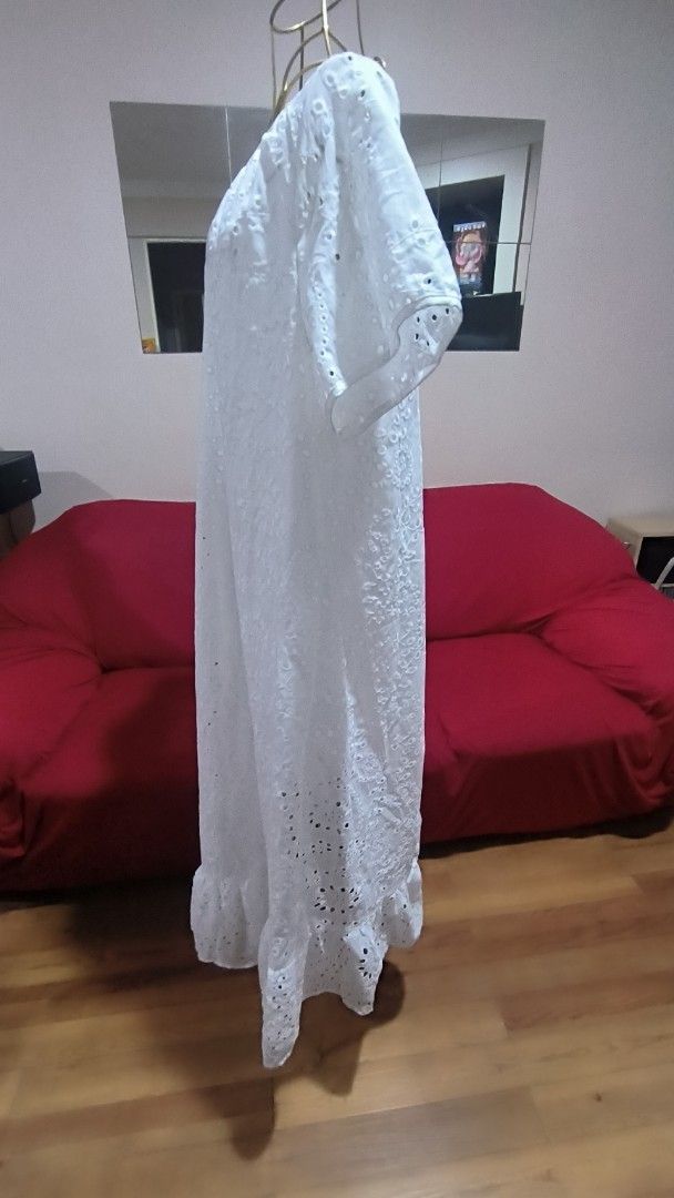 White Eyelet Lace Maxi Dress (Category: Dresses) located in Antipolo. Submitted by secondcharmstore (Listing ID 1452212384, Image 2). Description: -like new, no tag never worn -chest: 42-44 inches -waist: 44-46 inches -length: 48 inches - Beautiful white maxi dress - Intricate eyelet lace detailing - Short sleeves - Feminine ruffled hem - Lightweight and airy fabric - Ideal for summer occasions or beach cover-up - Easy to wear and comfortable.
