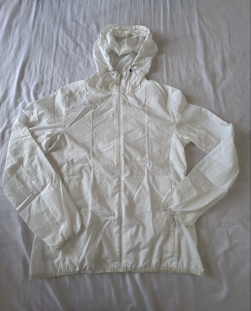 White Hooded Windbreaker Jacket (Category: Activewear) located in Cotabato. Submitted by 2yhbt5chct03639 (Listing ID 1452115613, Image 1). Description: Stay comfortable and stylish with this lightweight white hooded windbreaker. Designed with a full front zipper, adjustable drawstring hood, and side pockets, it's perfect for everyday wear, travel, jogging, or light outdoor activities..