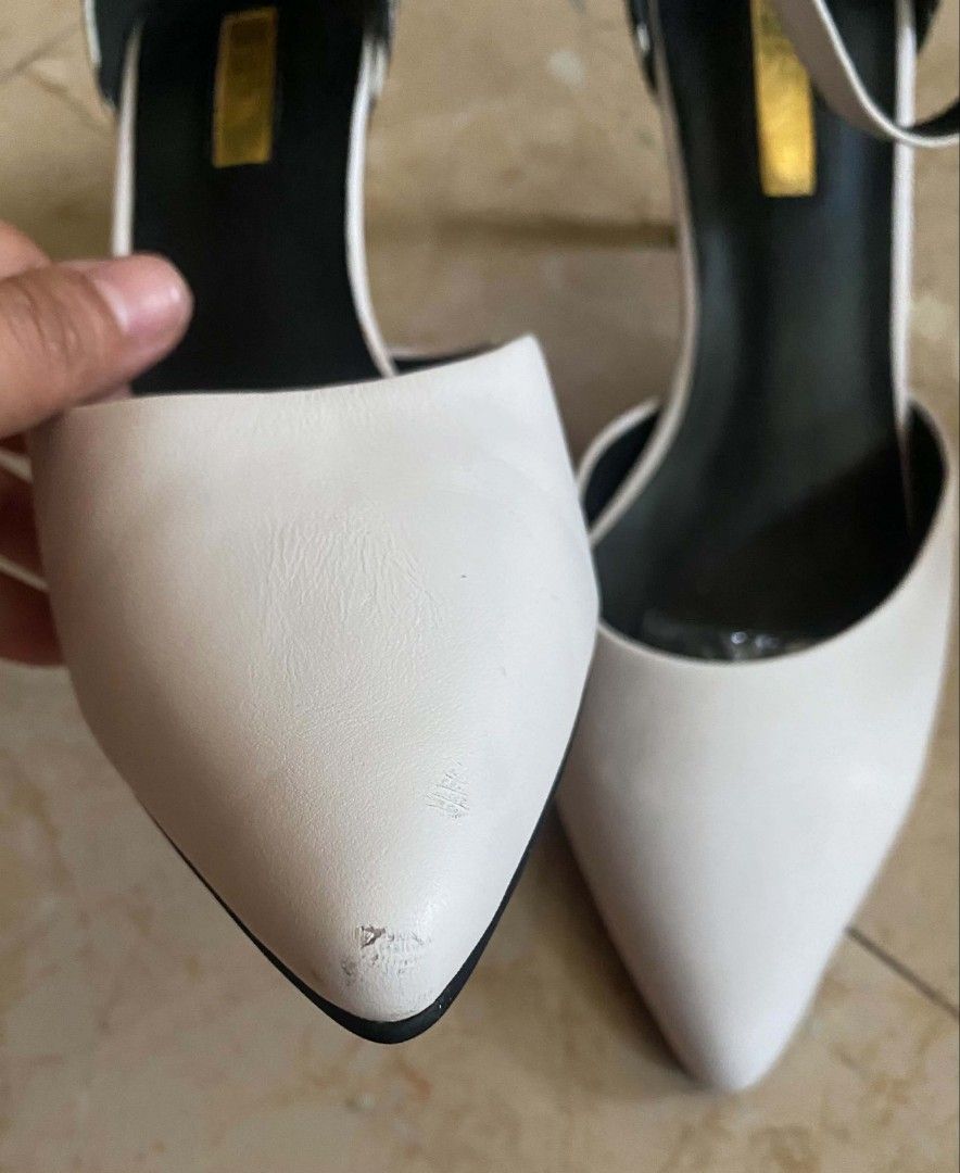 White Pointed Toe Heels with Ankle Strap and Zebra Print Heel (Category: Heels) located in Cebu City. Submitted by arni1 (Listing ID 1452157606, Image 3). Description: - White pointed toe heels - Secure ankle strap - Unique zebra print heel detail - Minor scuffs on toe area - Size: 240 (EU 37.5).