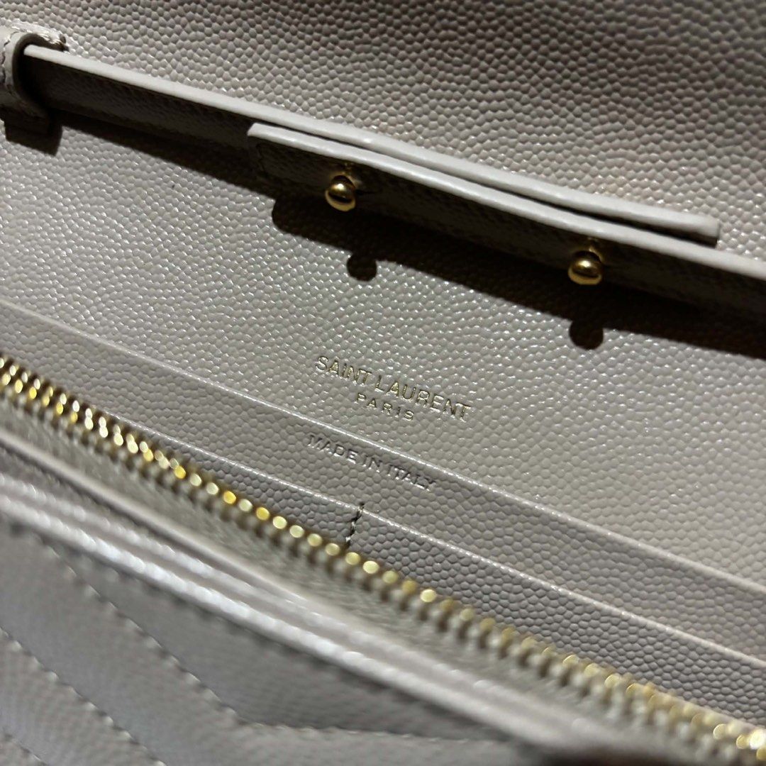 YSL Classic Cassandre Gold Chain Wallet (Category: Luxury Bags & Wallets) located in General Santos City (Dadiangas). Submitted by queenfinds (Listing ID 1452267547, Image 3). Description: Great condition No major flaws With dustbag No other inclusions Guaranteed authentic Saint Laurent Location is Gen. Santos City 64,995 only negotiable DM for more information .