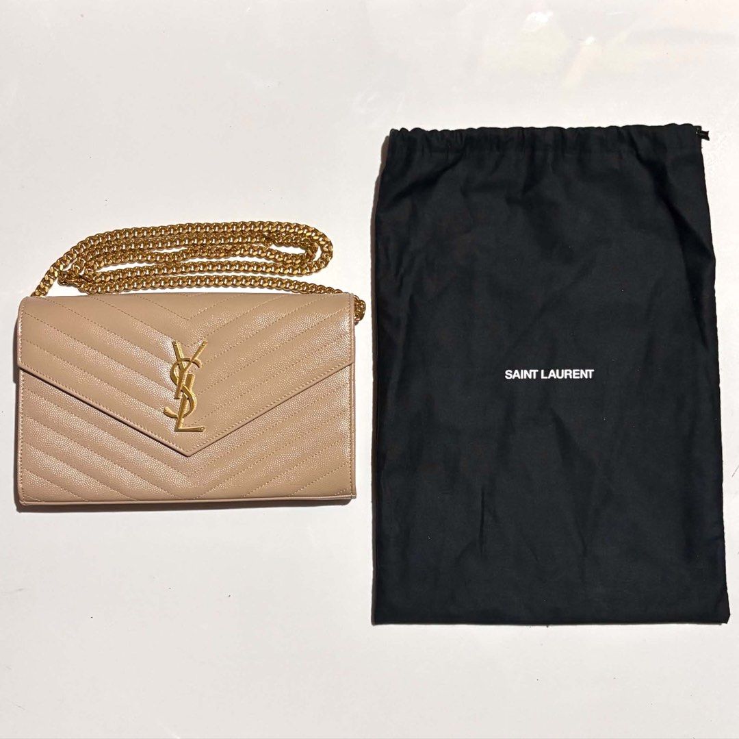 YSL Classic Cassandre Gold Chain Wallet (Category: Luxury Bags & Wallets) located in General Santos City (Dadiangas). Submitted by queenfinds (Listing ID 1452267547, Image 1). Description: Great condition No major flaws With dustbag No other inclusions Guaranteed authentic Saint Laurent Location is Gen. Santos City 64,995 only negotiable DM for more information .