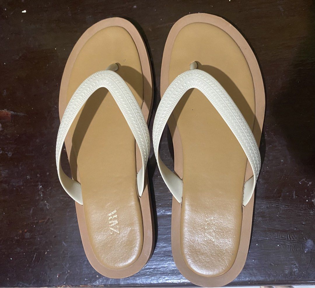 Zara Sandals Size 36 (Category: Flats & Sandals) located in Dasmarinas. Submitted by mar000ooon (Listing ID 1452224034, Image 1). Description: ‼️LAST PRICE POSTED‼️ - Zara Flip Flops - Color: White /Beige - Size: 36 - Features woven textured straps - Easy slip-on and off design -No return, No exchange -sf shouldered by the buyer - MOP— Maya ⚠️No Lowballers pls.