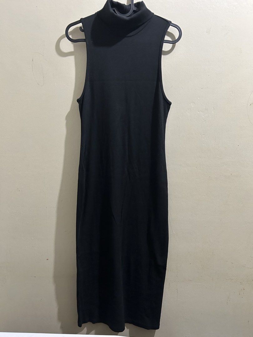 Zara Midi Dress (Category: Dresses) located in Manila. Submitted by prelovedbyntl (Listing ID 1452304061, Image 1). Description: - Zara black ribbed midi dress - Sleeveless with turtleneck - Hits around the knees - Simple and versatile - Perfect for layering or wearing on its own - Easy to dress up or down.