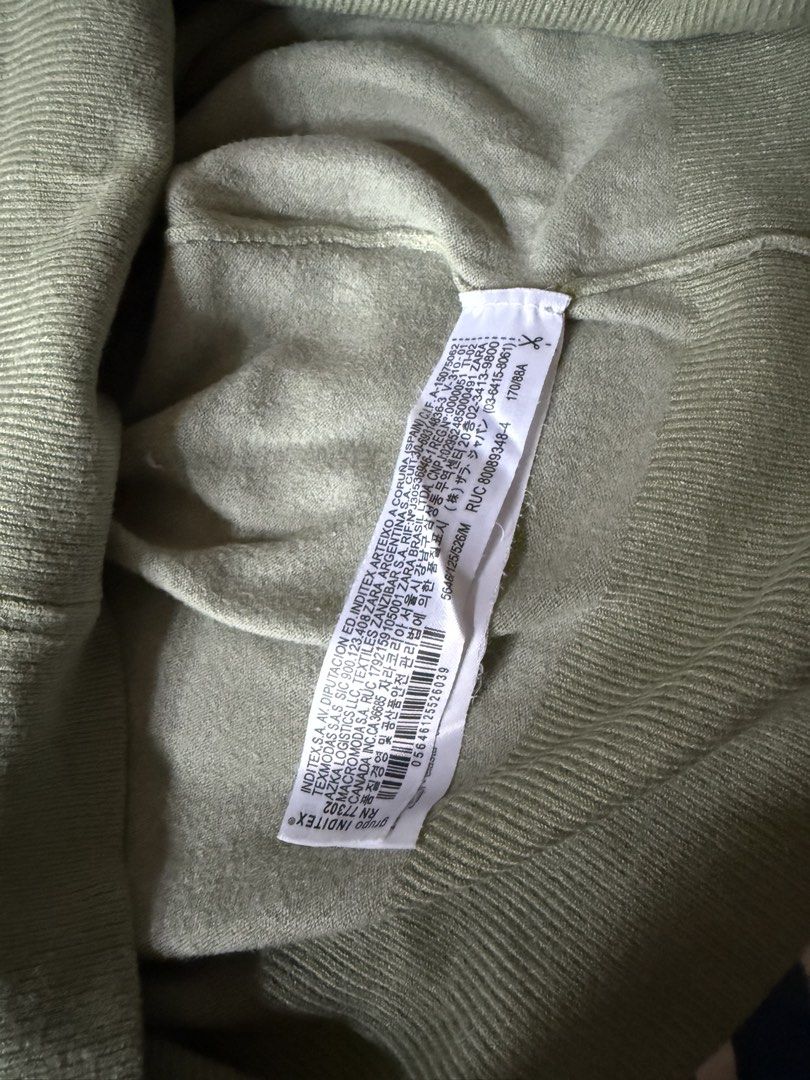 Zara Sage Green Fine Knit Top (Category: Blouses) located in Manila. Submitted by deoksun (Listing ID 1452193189, Image 3). Description: Zara fine-knit t-shirt Sage Green #Zara gold buttons at the back almost new refer to photos for the dimensions .