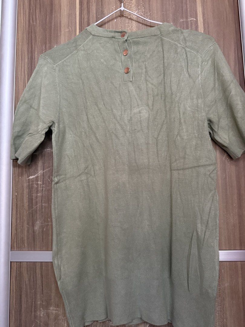 Zara Sage Green Fine Knit Top (Category: Blouses) located in Manila. Submitted by deoksun (Listing ID 1452193189, Image 2). Description: Zara fine-knit t-shirt Sage Green #Zara gold buttons at the back almost new refer to photos for the dimensions .