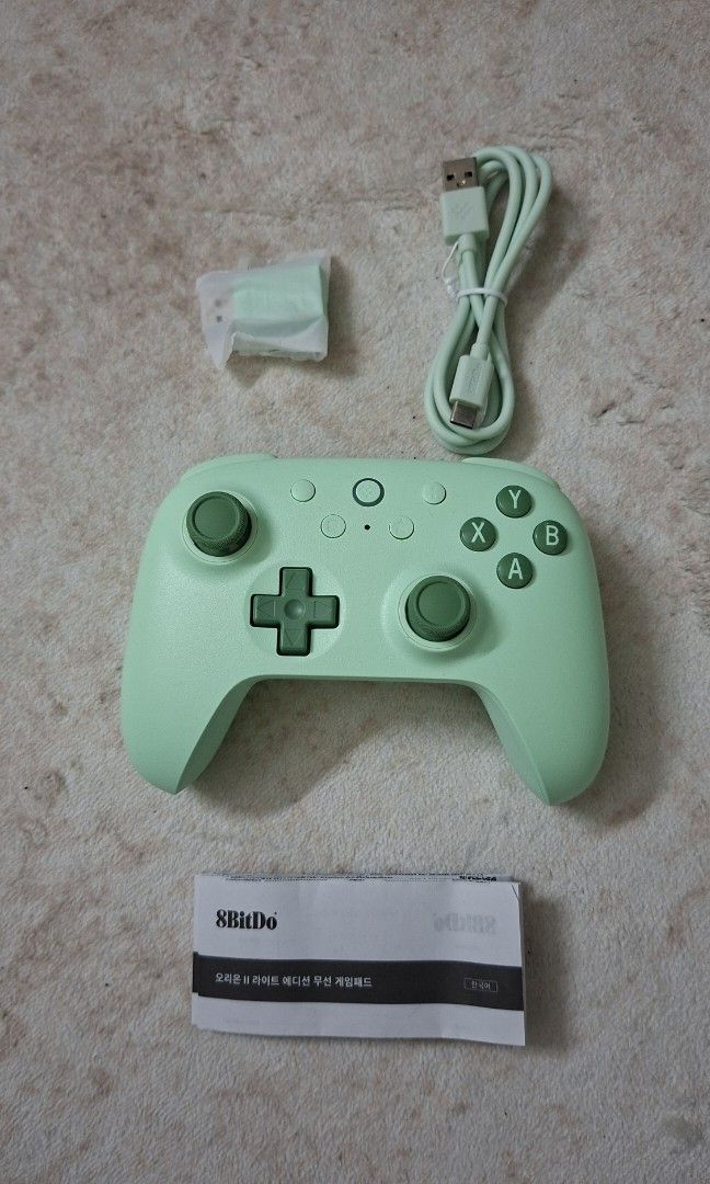 8bitDo Wireless Controller (Green) (Category: Controllers) located in Kuala Lumpur. Submitted by ntifay (Listing ID 1452351464, Image 3). Description: - Connectivity with 2.4G / Bluetooth / Wired USB - For Windows 10 & above / Android 9.0 & above.