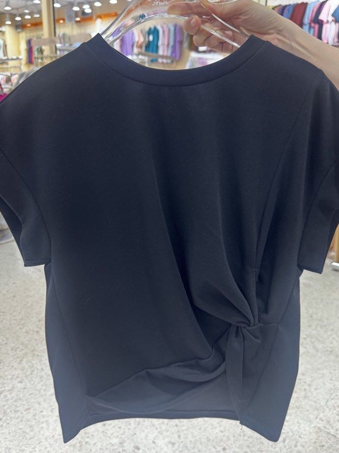 Mosaic Like Twisted Front Blouse from Bangkok (Multiple Colors Available) (Category: Blouses) located in Quezon City. Submitted by 0913cartz (Listing ID 1452370365, Image 2). Description: - Casual short-sleeve tee - Unique twisted knot detail on the front - Soft and comfortable fabric - Available colors: light blue, black, sage green, dark grey - Easy to pair with jeans or skirts - Ideal for everyday wear.