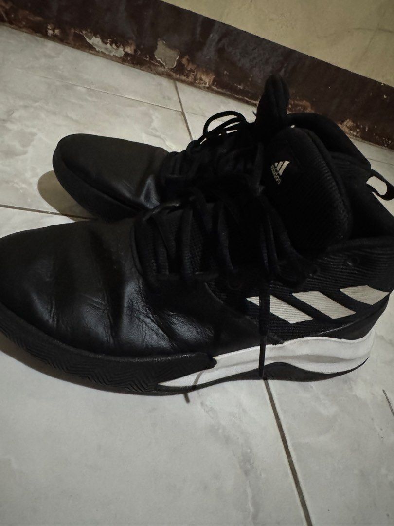 Adidas Black/White Basketball shoe (Category: Sneakers) located in Lucena. Submitted by Rors22 (Listing ID 1452428048, Image 2). Description: - Black high-top Adidas basketball shoes - Iconic white Adidas stripes on the side - Black laces - White and black soles with Adidas branding - Excellent grip for court performance - Ready to play!.