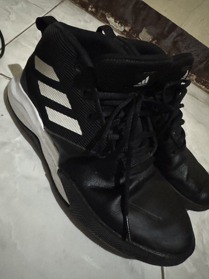 Adidas Black/White Basketball shoe (Category: Sneakers) located in Lucena. Submitted by Rors22 (Listing ID 1452428048, Image 1). Description: - Black high-top Adidas basketball shoes - Iconic white Adidas stripes on the side - Black laces - White and black soles with Adidas branding - Excellent grip for court performance - Ready to play!.