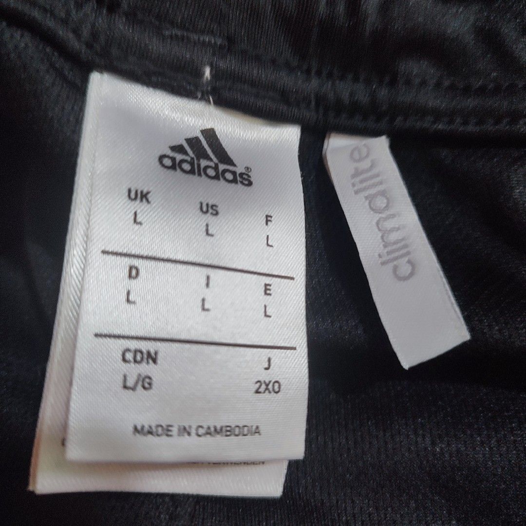 Adidas Climalite Athletic Shorts (Category: Shorts) located in Caloocan City. Submitted by sparkplug21 (Listing ID 1452507739, Image 3). Description: - Black Adidas shorts - Climalite material for breathability - Size L (UK/US/F/D/I/E), L/G (CDN), 2XO (J) - Made in Cambodia - Ideal for sports or casual wear.