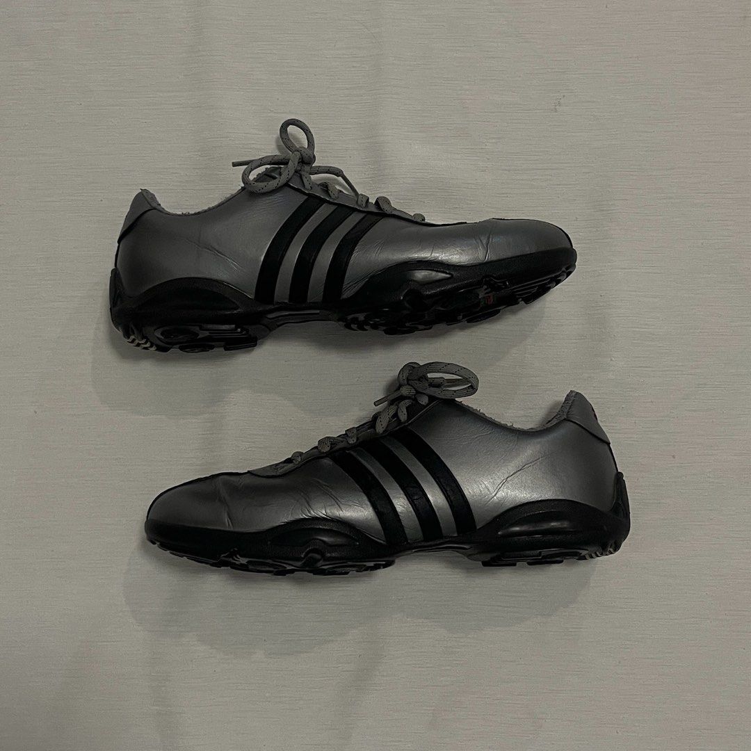 Adidas Golf Shoes - Silver/Black (Category: Golf) located in Dasmarinas. Submitted by minx203 (Listing ID 1452496434, Image 1). Description: - Adidas golf shoes - Metallic silver and black colorway - Classic three stripes design - Excellent sole grip for the golf course - Comfortable and stylish for your game - Grey laces.