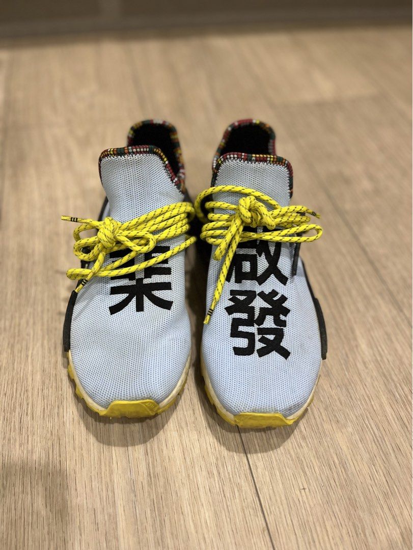 Adidas Pharrell Williams Human Race NMD 'Inspiration Pack' (Category: Sneakers) located in Manila. Submitted by oddpenguin.51b (Listing ID 1452460534, Image 1). Description: - Light blue Adidas Pharrell Williams Human Race NMD sneakers - Unique yellow laces - Black Chinese characters on the toe box - Colorful patterned heel collar lining - Original .