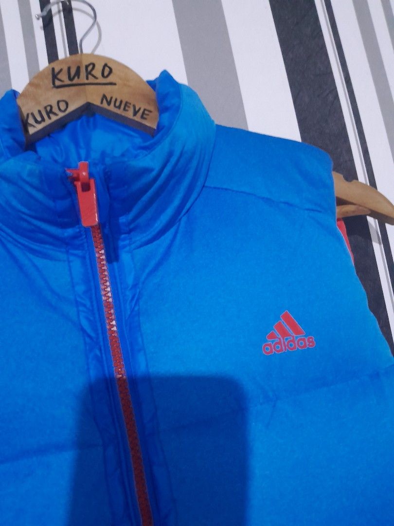 Adidas Puffer Vest Blue Green Red (Category: Vests) located in Lucena. Submitted by kuronueve0909 (Listing ID 1452445710, Image 2). Description: Adidas puffer vest Waterproof Reversible Size: medium Width: 20.5 Length: 25 Price: ₱999 No issue ✅️ Ready to wear ✅️ Dm 📩 .