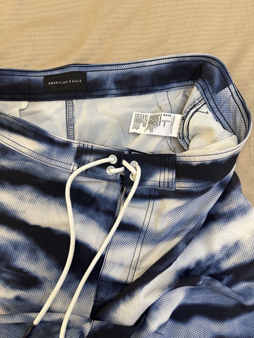 American Eagle Swim Trunks size XL (Category: Swim Trunks & Board Shorts) located in Pasay City. Submitted by behua (Listing ID 1452455096, Image 3). Description: - swim trunks from American Eagle - Blue and white pattern - with drawstring - Ideal for the beach or pool No issues No meet up.