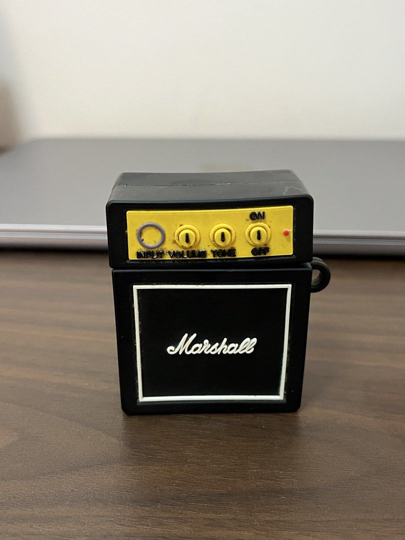 Apple AirPods with Marshall Case (Category: Earphones) located in Bacolod City. Submitted by ejdp_24 (Listing ID 1452333779, Image 2). Description: Not sure if working, connection issues hence can't check if may audio output 🥲 With Marshall case Guaranteed authentic, old version Disinfected na and cleaned, small black marks from usage.