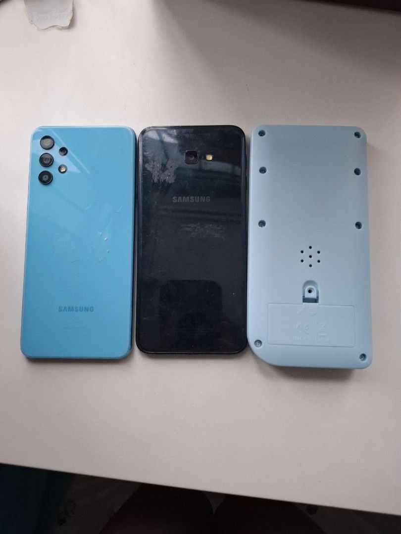 Assorted Items (Category: Everything Else) located in Singapore. Submitted by mjtsai1 (Listing ID 1452427753, Image 2). Description: Device on the left: - Samsung Galaxy A32 5G - Colour: Awesome Blue - Features: Headphone jack, USB-C port - Reason for selling: Upgraded to a new phone -Storage 128GB -SCREEN HAS BEEN WATER DAMAGED TAKE NOTE Device in the middle: -Samsung Galaxy J4+ -Colour: Black -Storage 32GB -Micro USB port Device on the right: H