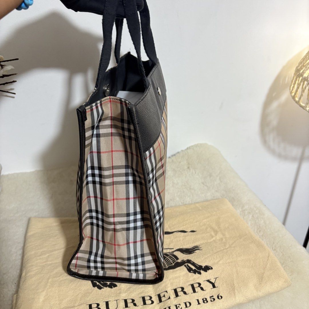 Authentic Burberry London Nova Check Tote Bag (Category: Luxury Bags & Wallets) located in Binangonan. Submitted by makoleksyon (Listing ID 1452488060, Image 2). Description: Excellent condition Like new No flaws Comes with dust bag size: H-10 x W-13 x 5.5 inches Bought in Japan 💯% Authentic Money back guarantee.