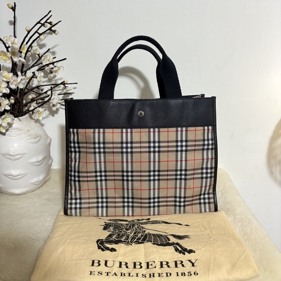 Authentic Burberry London Nova Check Tote Bag (Category: Luxury Bags & Wallets) located in Binangonan. Submitted by makoleksyon (Listing ID 1452488060, Image 1). Description: Excellent condition Like new No flaws Comes with dust bag size: H-10 x W-13 x 5.5 inches Bought in Japan 💯% Authentic Money back guarantee.