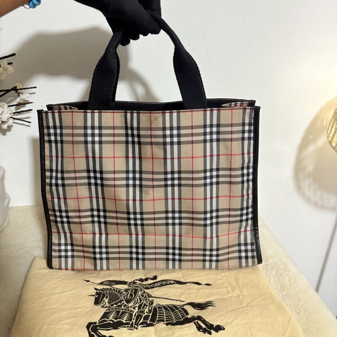 Authentic Burberry London Nova Check Tote Bag (Category: Luxury Bags & Wallets) located in Binangonan. Submitted by makoleksyon (Listing ID 1452488060, Image 3). Description: Excellent condition Like new No flaws Comes with dust bag size: H-10 x W-13 x 5.5 inches Bought in Japan 💯% Authentic Money back guarantee.
