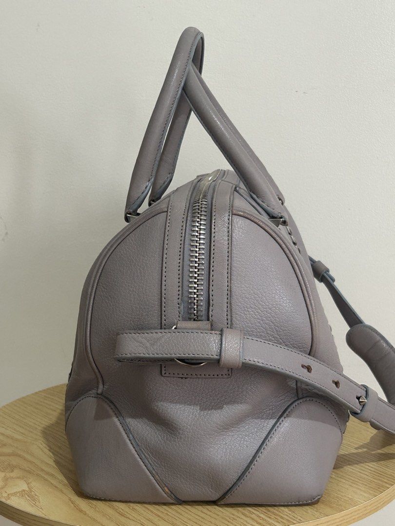 Authentic GIVENCHY LUCREZIA Medium 2-way Bag RECOLORED (Category: Luxury Bags & Wallets) located in Las Pinas. Submitted by jc_closet (Listing ID 1452413511, Image 3). Description: 💯 Authentic or Money Back Condition : 8/10 Clean Interior Flaw : Recolored Body of bag, Handles and Strap gum lining. Rubs on all corners Bawal po sa Maselan!!! Color : Gray with Chain Detail Dimensions and Features Length: 12.75 in (32.5 cm) Width/Depth: 7 to 8 in (1