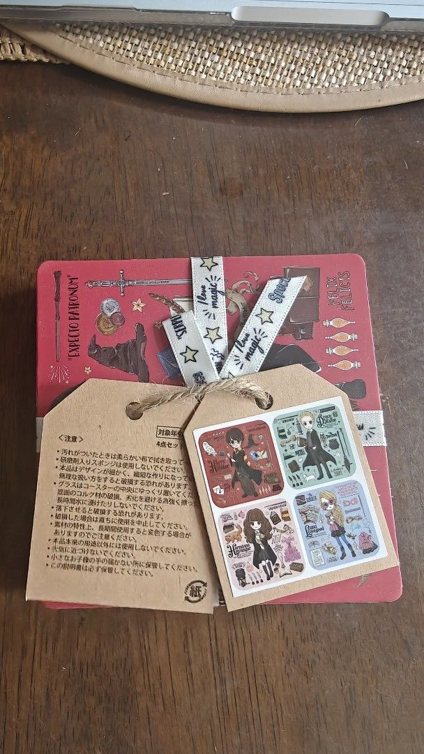 Authentic Harry Potter Coaster Set (Direct from Japan! (Category: Dinnerware & Cutlery) located in Las Pinas. Submitted by marjmd (Listing ID 1452321196, Image 2). Description: 4-Piece Collectible Set: 🔴 Harry Potter 🟢 Draco Malfoy 🟤 Hermione Granger 🔵 Luna Lovegood Tied in original decorative ribbon 🎀 Cork backing for tabletop protection ☕ 100% Brand New & Never Used -was acquired directly in Japan (Universal Studios Japan / Harry Potter Sh