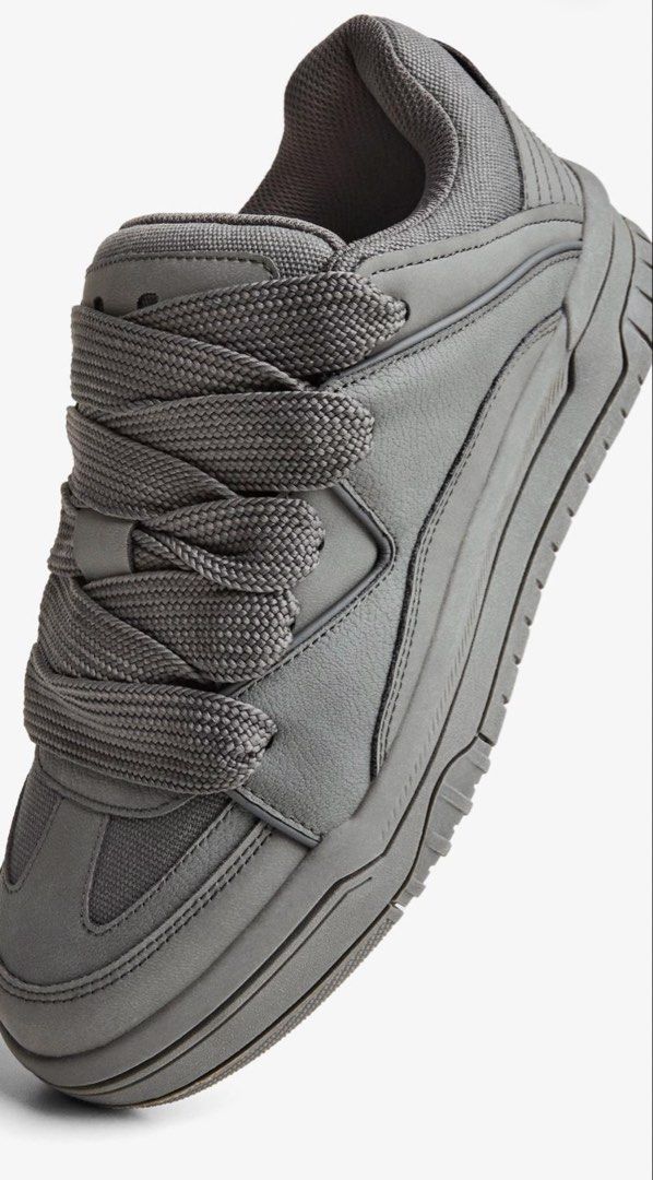 Bershka BASIC SKATE TRAINERS (Category: Casual Shoes) located in Quezon City. Submitted by vjay19 (Listing ID 1452363900, Image 2). Description: - Brand: Bershka - Style: Chunky basic trainers sneakers - Color: Grey - Closure: Lace-up with thick laces - Features: Platform sole for extra height - Condition: Brand new, never worn, still has tags on - Reason for Selling: diko pala bagay 😅 - Perfect for: Adding a cool, trendy vibe to your outfit! - 