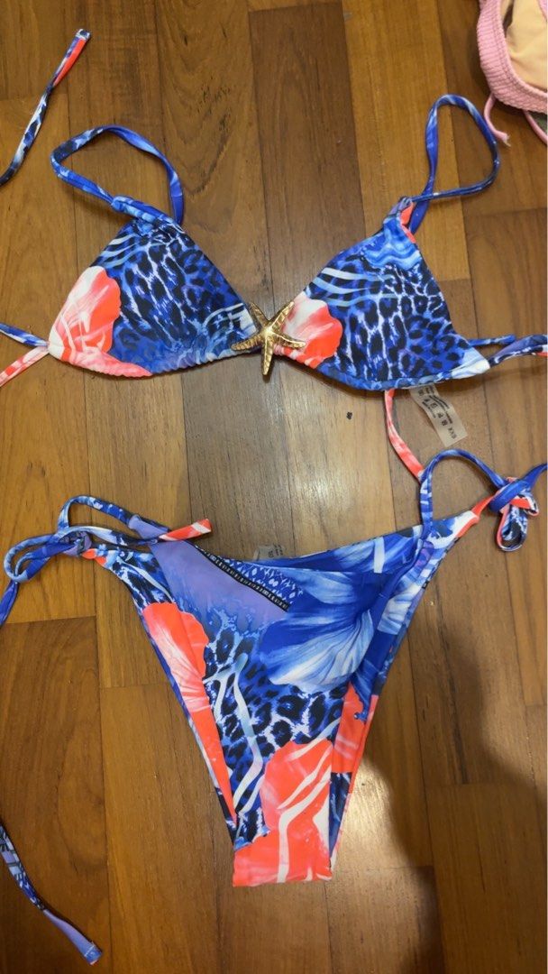 Bikini bundle set (Category: Bikinis & Swimsuits) located in Singapore. Submitted by farrahgwen40083 (Listing ID 1452438995, Image 3). Description: - Roxy bikini set in olive green - shein set in yellow floral print - cotton on Pink ribbed bikini set - SHEIN Black bikini set with pink bows - SHEIN blue-pink floral gold star fish design - All are tie-up styles - Ideal for beach days and pool parties - all sold together in bundle .