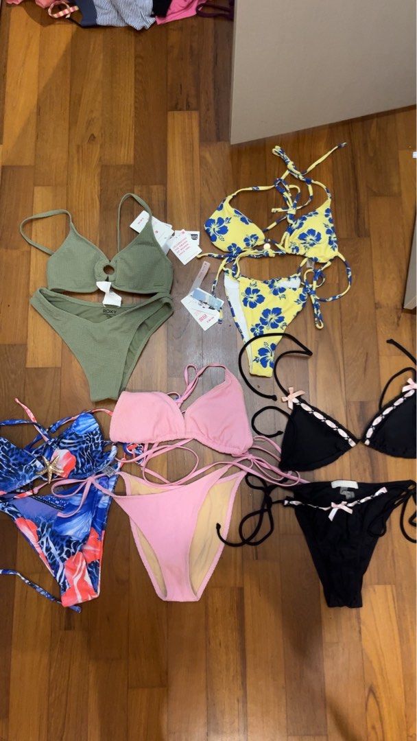 Bikini bundle set (Category: Bikinis & Swimsuits) located in Singapore. Submitted by farrahgwen40083 (Listing ID 1452438995, Image 1). Description: - Roxy bikini set in olive green - shein set in yellow floral print - cotton on Pink ribbed bikini set - SHEIN Black bikini set with pink bows - SHEIN blue-pink floral gold star fish design - All are tie-up styles - Ideal for beach days and pool parties - all sold together in bundle .