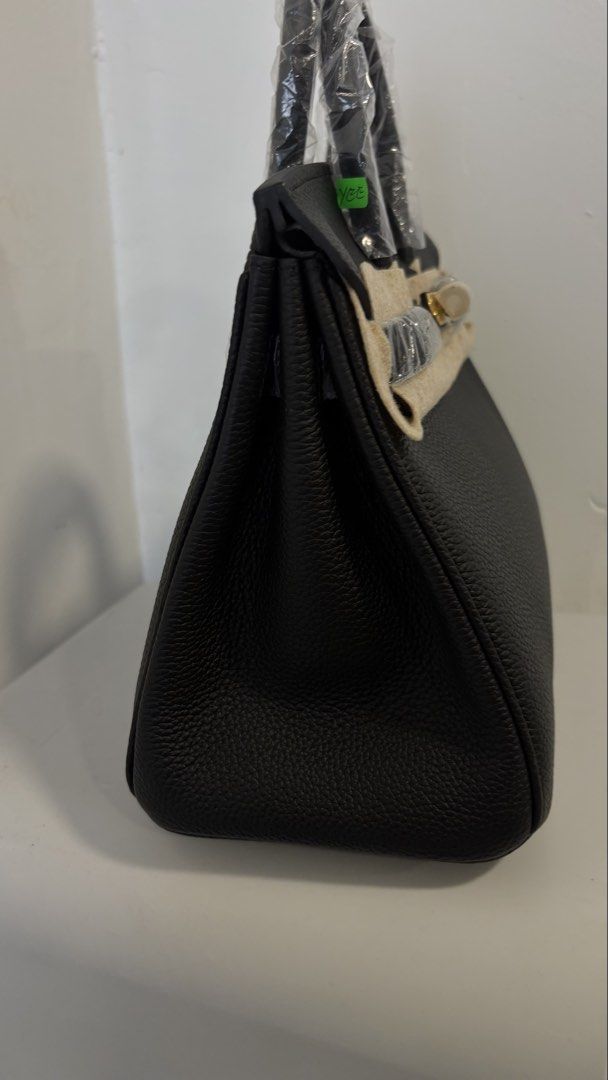 BIRKIN 25 (Category: Bags & Wallets) located in Kuala Lumpur. Submitted by misstrendy (Listing ID 1452386748, Image 3). Description: - Brand: Hermes - Model: Birkin 25 - Color: Black - Material: Pebbled Leather - Hardware: Gold - Condition: Excellent (as pictured) - Size: 25cm - Meetup Location: Ampang Point Shopping Centre, Selangor.