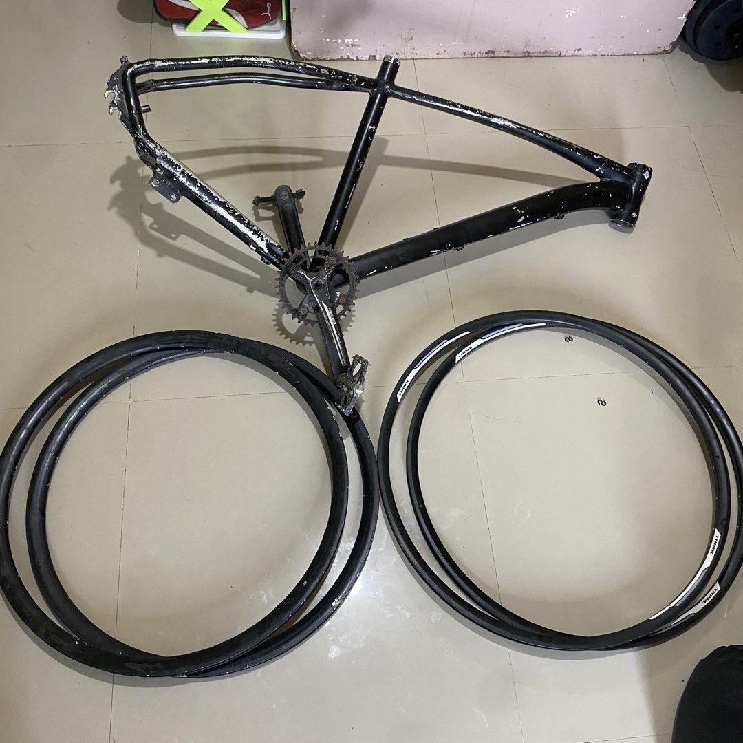 Black Bicycle Frame with Crankset and Two Wheels (Category: Bicycles) located in Manila. Submitted by josfts (Listing ID 1452477684, Image 1). Description: 💥 Cole bike frame repainted (take all) - P1.1k 📌Issue: chip paint/scratches 💥 Alloy Stock rims: trinx 32 holes (27er) - P400 📌Issue: minimal paint chipped 💥 Alloy Stock rims: unkown brand 36 holes (26er) - P200 📌Issue: major paint chipped.
