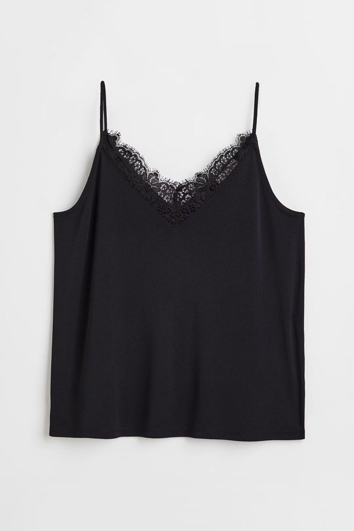 Black Lace Top (Category: Sleeveless) located in Manila. Submitted by paperthread (Listing ID 1452485693, Image 1). Description: - Chic black cami top - Delicate lace trim on V-neck and hem - Adjustable spaghetti straps for a perfect fit - Smooth, silky fabric - Ideal for layering or as a standalone piece - Adds a touch of elegance to any outfit.
