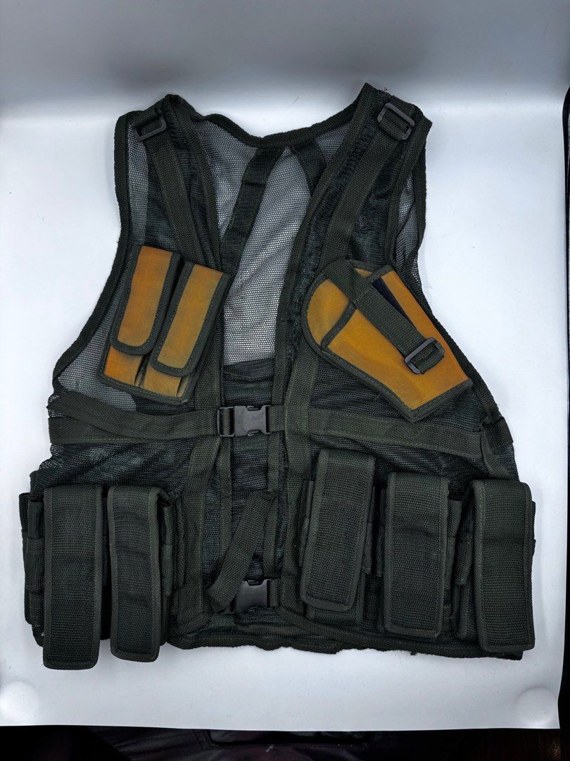 Black Mesh Tactical Vest with Pouches (Category: Vests) located in Manila. Submitted by mysticstar_d67ad3_tree (Listing ID 1452330870, Image 1). Description: Used only on 4 Halloween occasions. Purchase in Clark Airbase. Looks like a Vietnam/Guerilla classic style vest - Black tactical mesh vest - Multiple storage pouches - Adjustable straps for a custom fit - Large zippered pocket on the back - Ideal for outdoor activities, airsoft, or costumes 