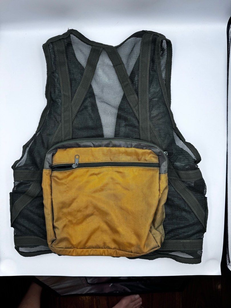 Black Mesh Tactical Vest with Pouches (Category: Vests) located in Manila. Submitted by mysticstar_d67ad3_tree (Listing ID 1452330870, Image 2). Description: Used only on 4 Halloween occasions. Purchase in Clark Airbase. Looks like a Vietnam/Guerilla classic style vest - Black tactical mesh vest - Multiple storage pouches - Adjustable straps for a custom fit - Large zippered pocket on the back - Ideal for outdoor activities, airsoft, or costumes 