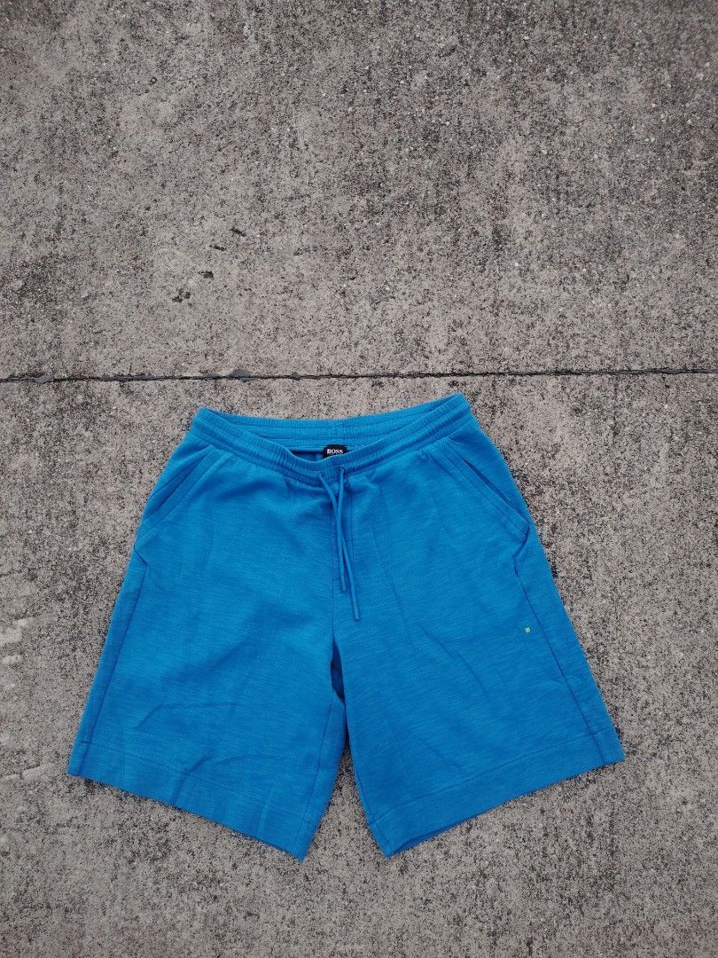 BOSS Hugo Boss Blue Sweat Shorts (Category: Shorts) located in Calapan. Submitted by thriftopia_12 (Listing ID 1452448015, Image 3). Description: - Blue BOSS Hugo Boss sweat shorts - Elastic waistband with drawstring - Two side pockets - Comfortable material for lounging or casual wear - Great for everyday use.